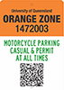 Traffic sign with text University of Queensland, Orange Zone, 1472003, motorcycle parking casual and permit at all times