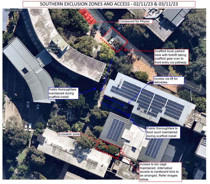 A aerial view of a building with solar panelsDescription automatically generated